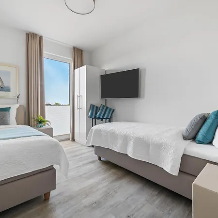 Apartment Beachterracethree- Eg, Barrierearm, Meerblick, Terrasse, Kamin, Sauna Olpenitz